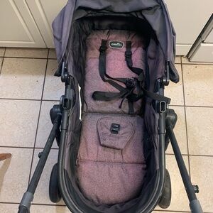 Evenflo Stroller with Black and Purple Seat